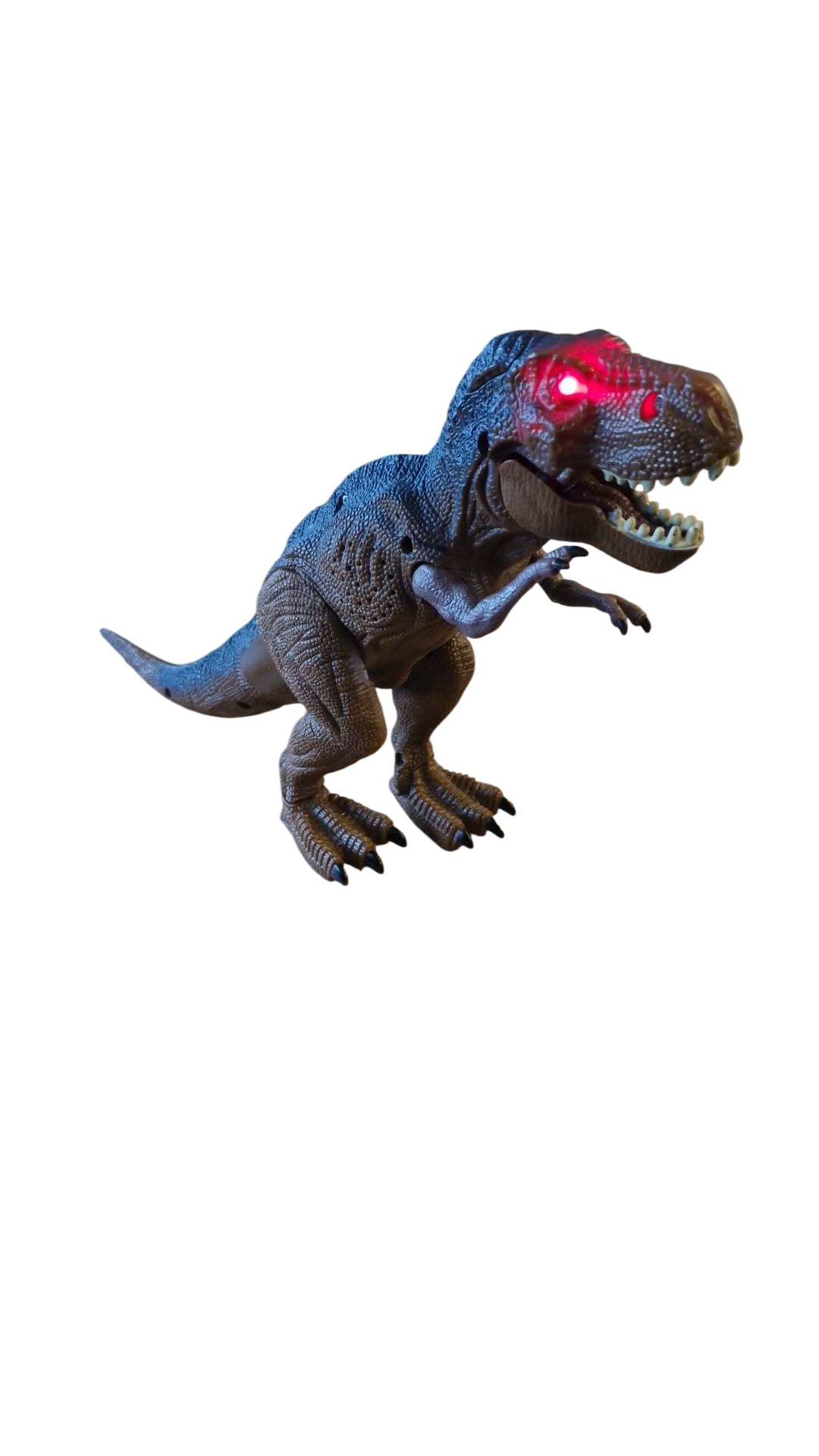 Risaeðla sem labbar og öskrar, rauð ljós í augum. Önnur framlöppin hefur verið límd á