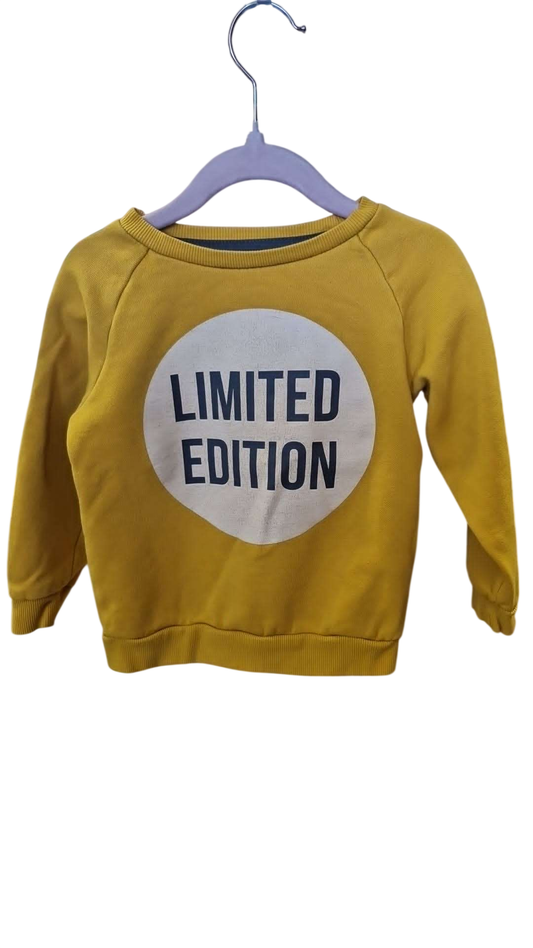 Primark gul peysa 98